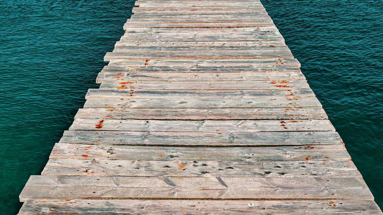 Wooden pier over a lake.