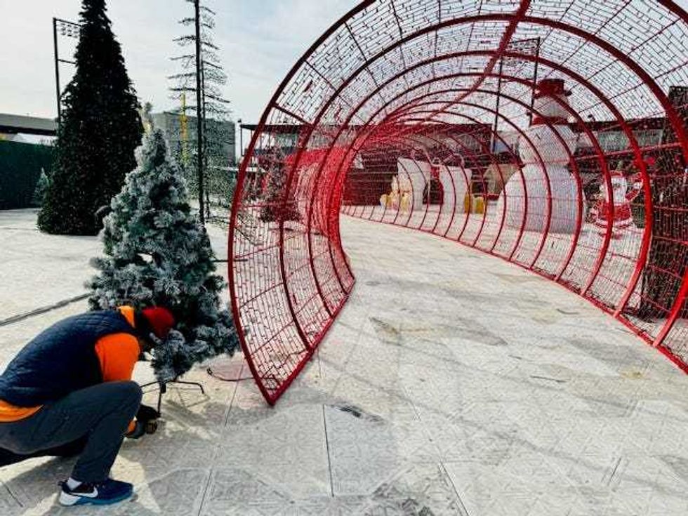 Worker assembling Sparkle Light Festival