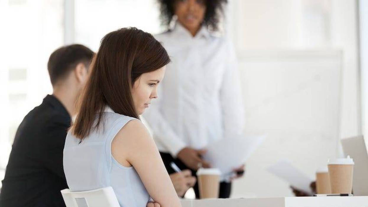 Worker frustrated during meeting