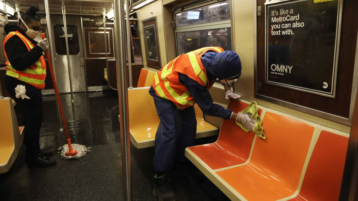Workers clean a station as the New York City subway system, the largest public transportation system in the nation, is closed for nightly cleaning due to the continued spread of the coronavirus on May 07, 2020 in New York City.