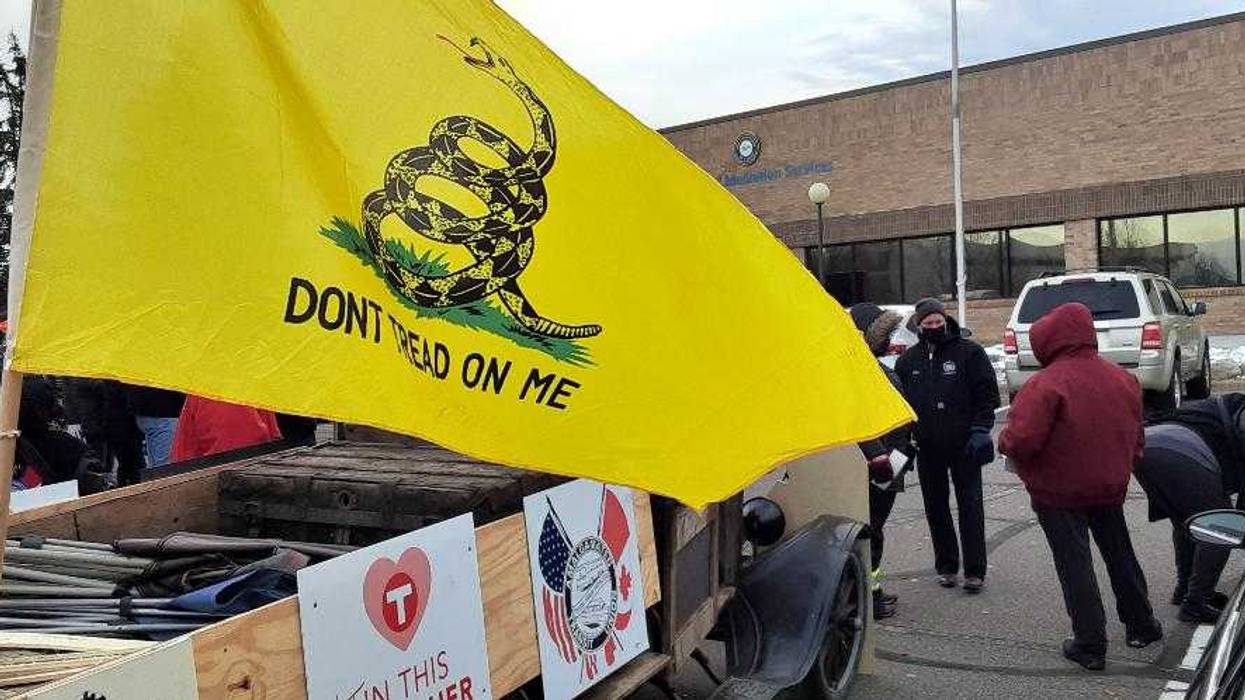 Workers gather outside Metro Transit contract talks