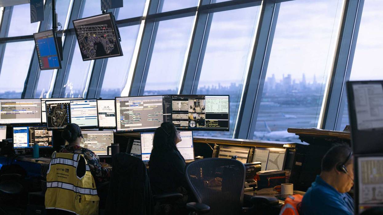 Workers in the United Airlines Station Operation Center at Newark Liberty International Airport (EWR) in Newark, New Jersey, US, on Tuesday, March 19, 2024