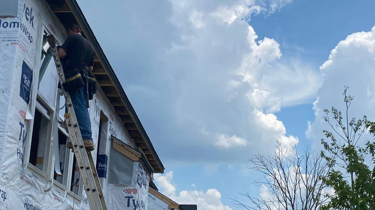 Workers outside on a 95 degree day in metropolitan Philadelphia.