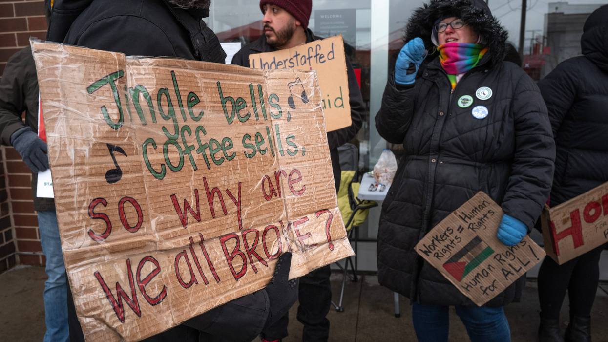 Workers picket outside of a Starbucks store on Dec. 20, 2024 in Chicago, Illinois.