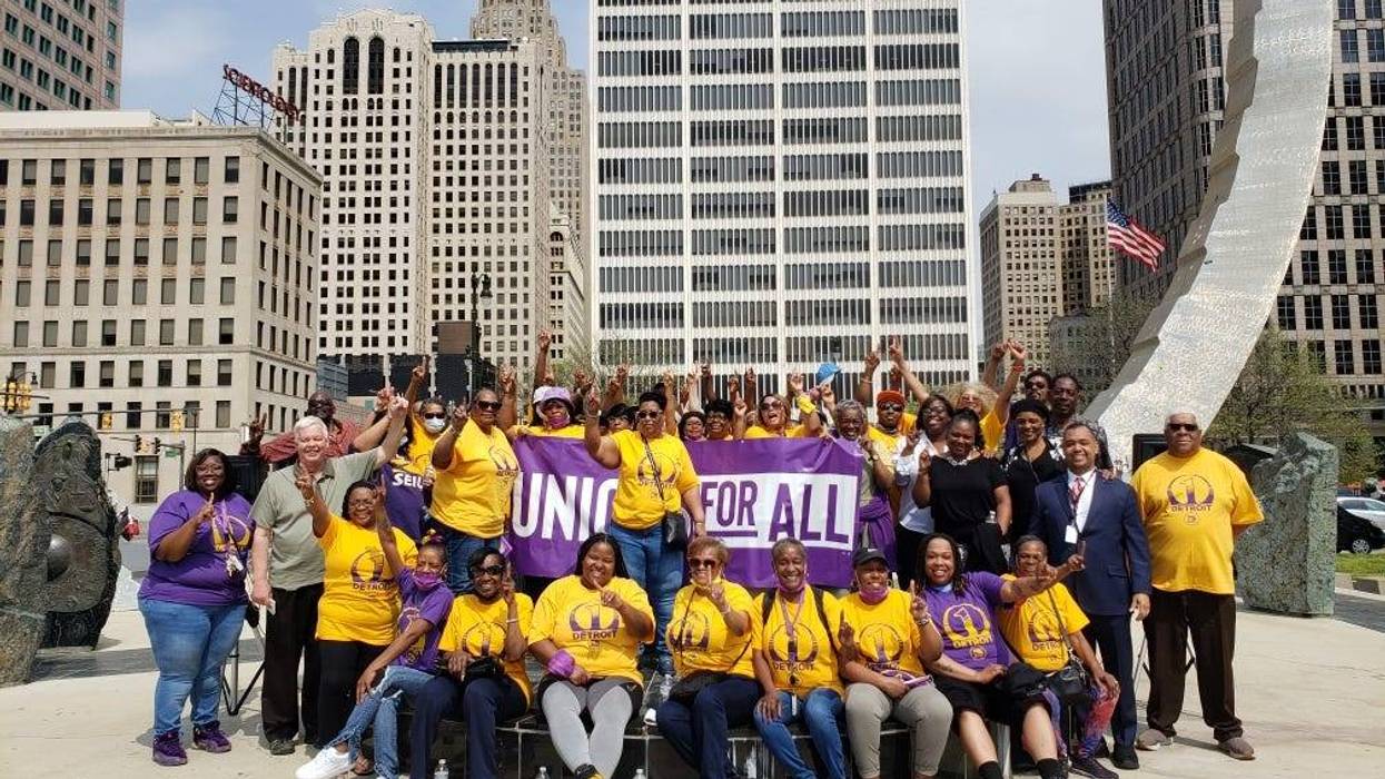 Workers rallying in Detroit's Hart Plaza