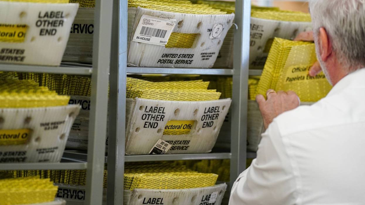 Workers sort mail ballots on Nov. 5, 2024, at Northampton County Courthouse in Easton, Pennsylvania.