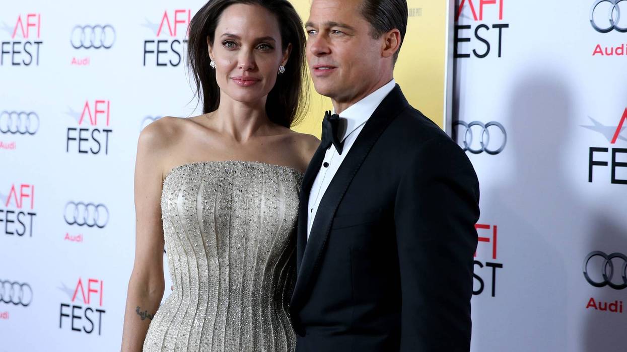 Writer-director-producer-actress Angelina Jolie Pitt (L) and actor-producer Brad Pitt attend Audi at the opening night gala premiere of 'By the Sea' during AFI FEST 2015 presented by Audi at TCL Chinese 6 Theatres on November 5, 2015 in Hollywood, California