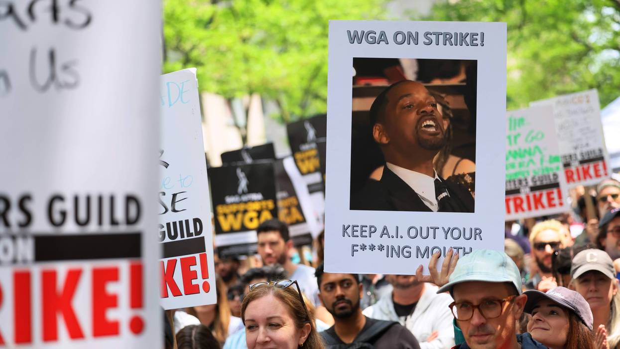 Writers Guild of America (WGA) East members participate in a “Rally at the Rock” strike event outside of the NBCUniversal offices on May 23, 2023 in New York City. On the fourth week of the of the Hollywood writers strike WGA East members were joined by prominent writers, labor leaders, elected officials, and members of various unions as they held a rally at 30 Rock.