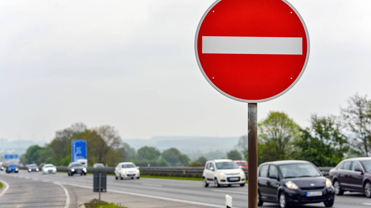 wrong way highway exit sign