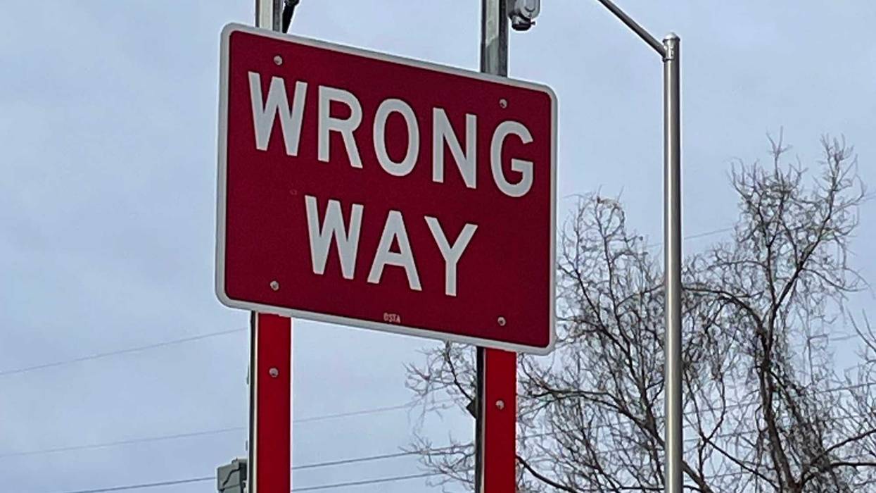 "Wrong way" sign with motion-activated flashing lights at an I-84 ramp in Southington, 3/10/23