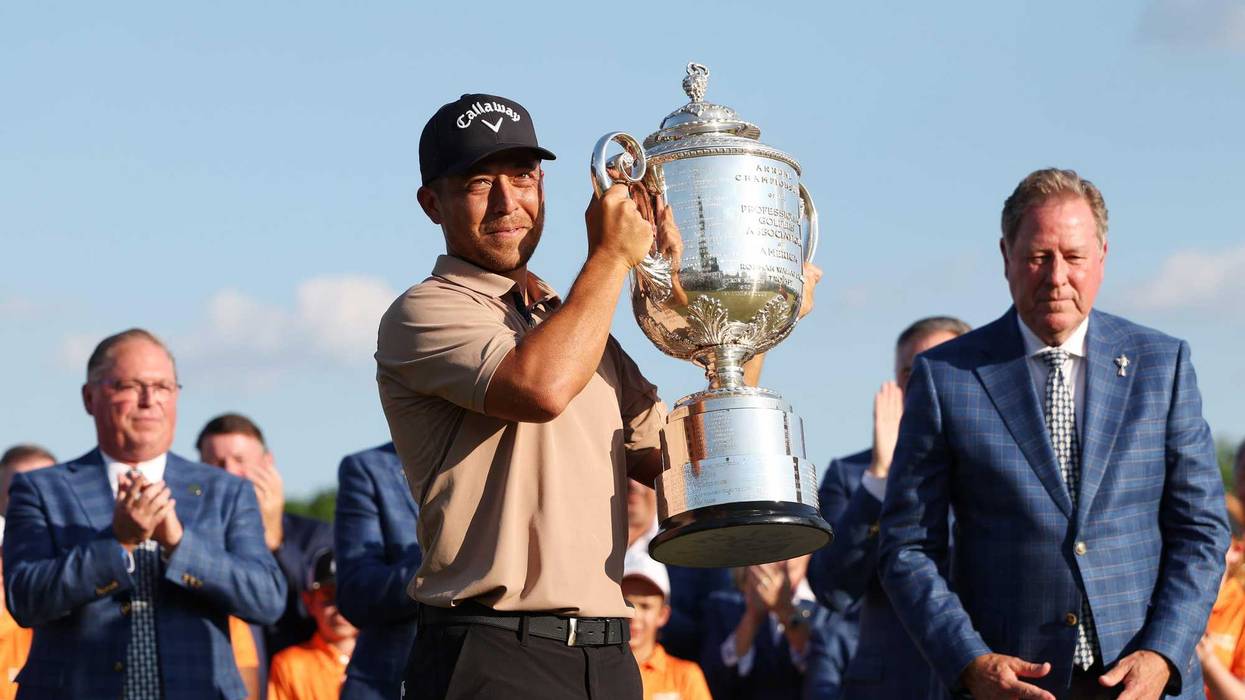 Xander Schauffele of the United States celebrates with the Wanamaker Trophy after winning the 2024 PGA Championship at Valhalla Golf Club on May 19, 2024, in Louisville, Ky.