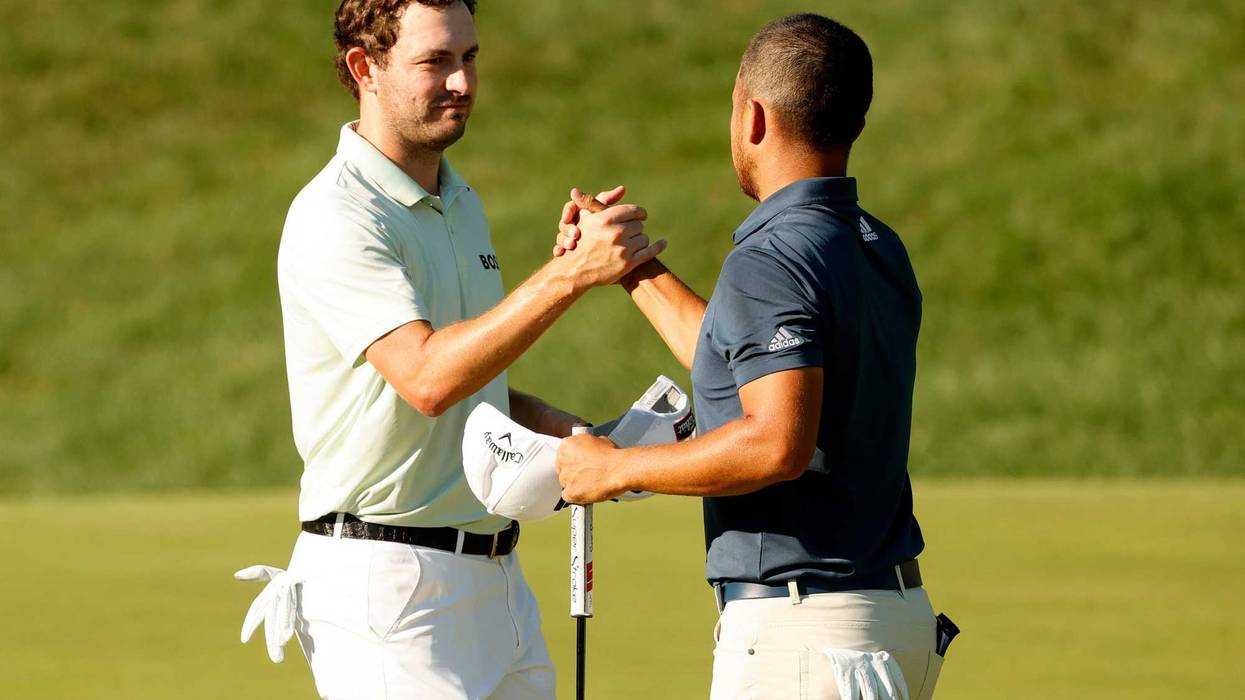 Xander Schauffele (R) and Patrick Cantlay finish their third round of the Travelers Championship in Cromwell, 6/25/22