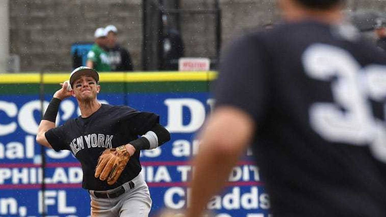 Yankees infielder Troy Tulowitzki throws to first base during a spring training game against the Philadelphia Phillies on March 17, 2019, in Clearwater, Florida.