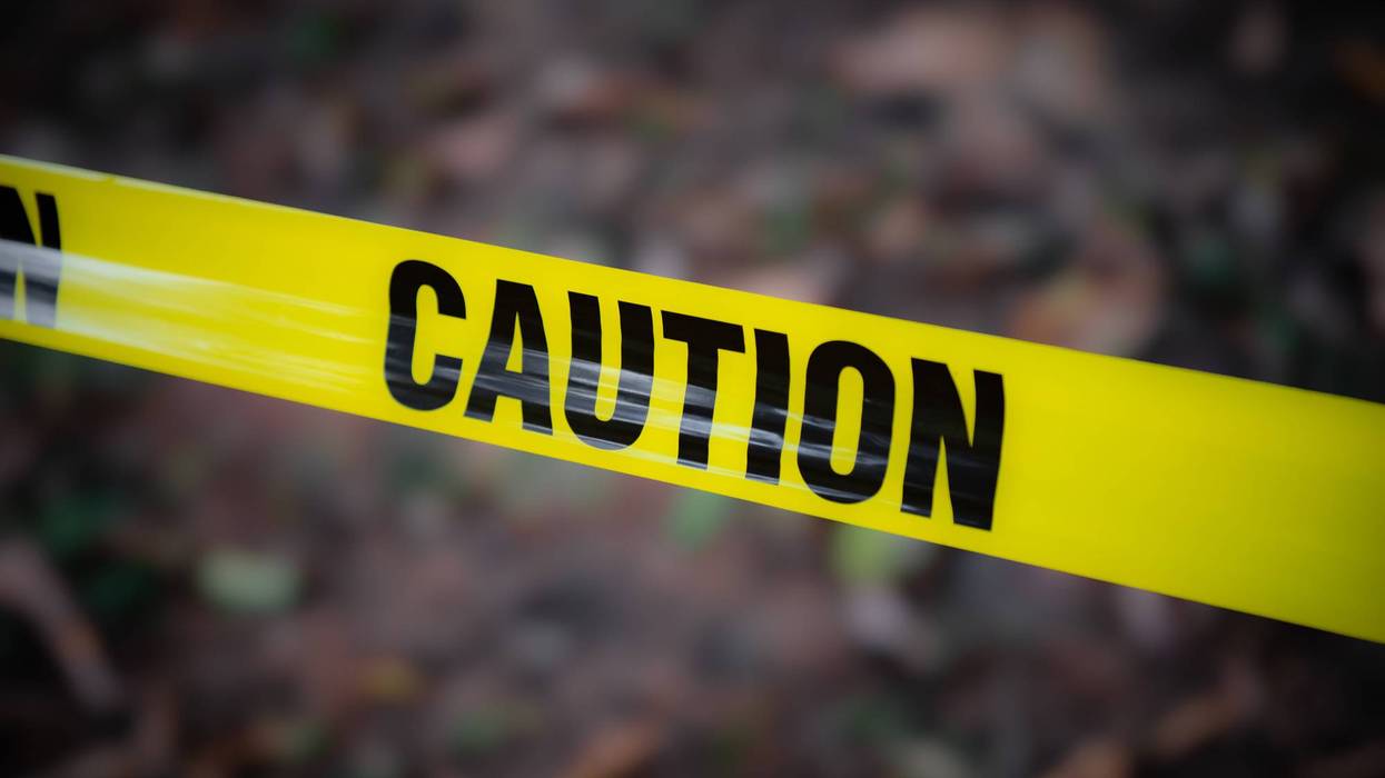 Yellow caution tape forest woods grounds outdoors warning danger barrier
