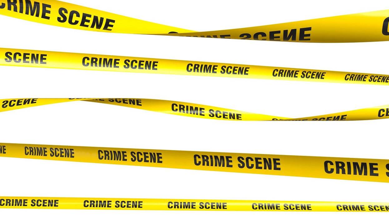 Yellow crime scene tapes hanging and blocking access - stock photo