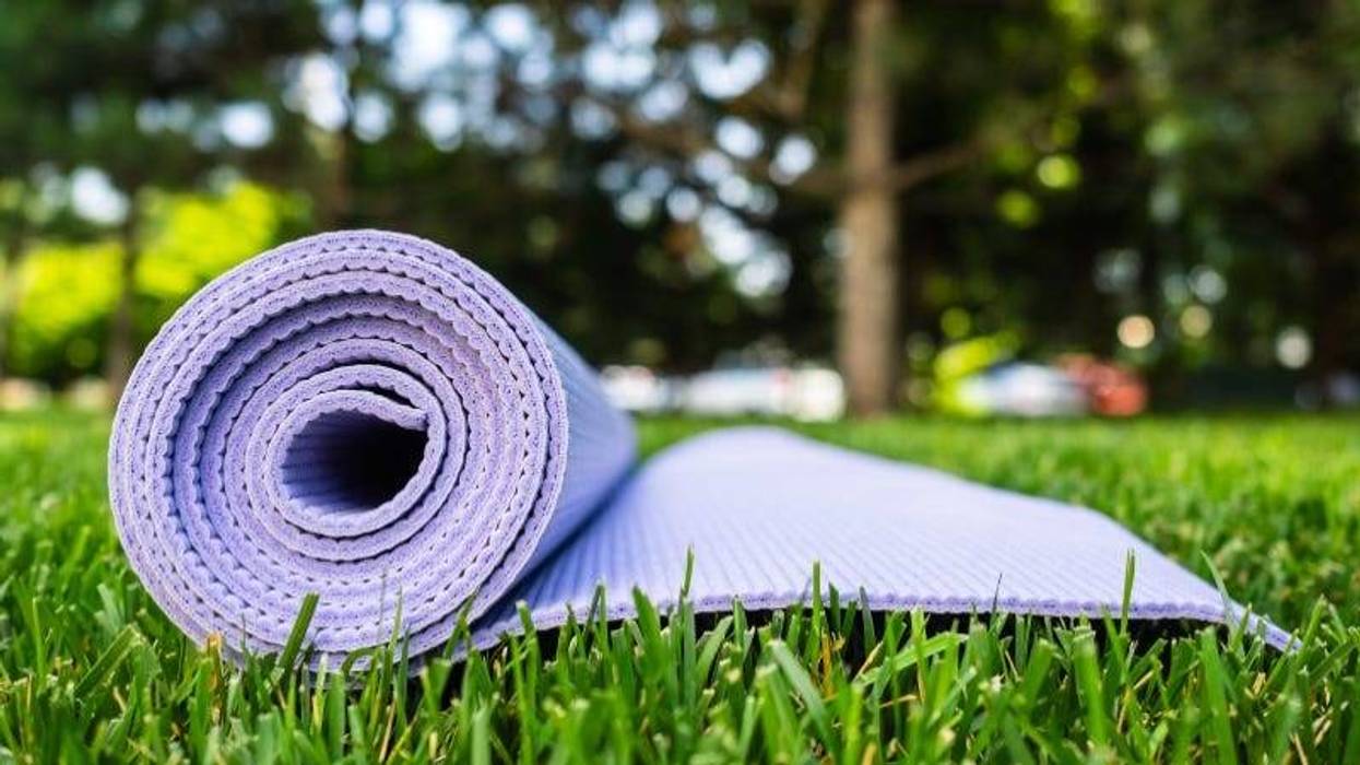 Yoga mat on grass Getty Images
