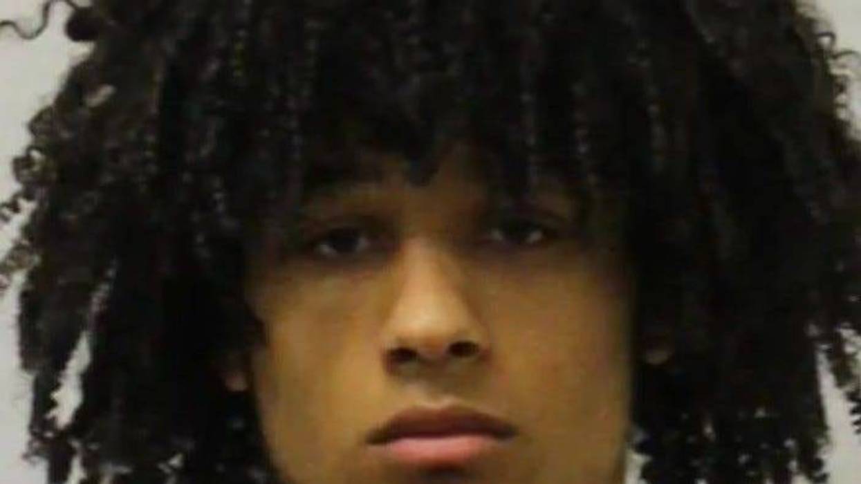Young Black man with curly hair