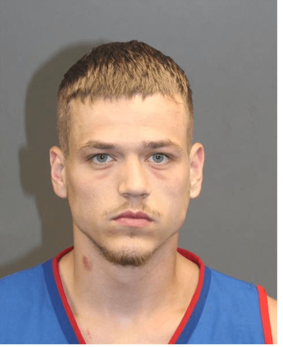 Young blonde man mugshot