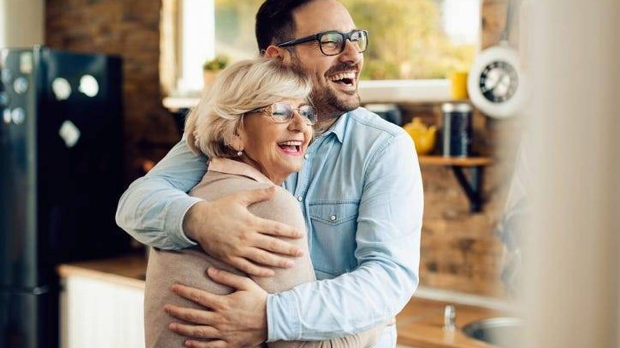 Young Man and Mom hugging
