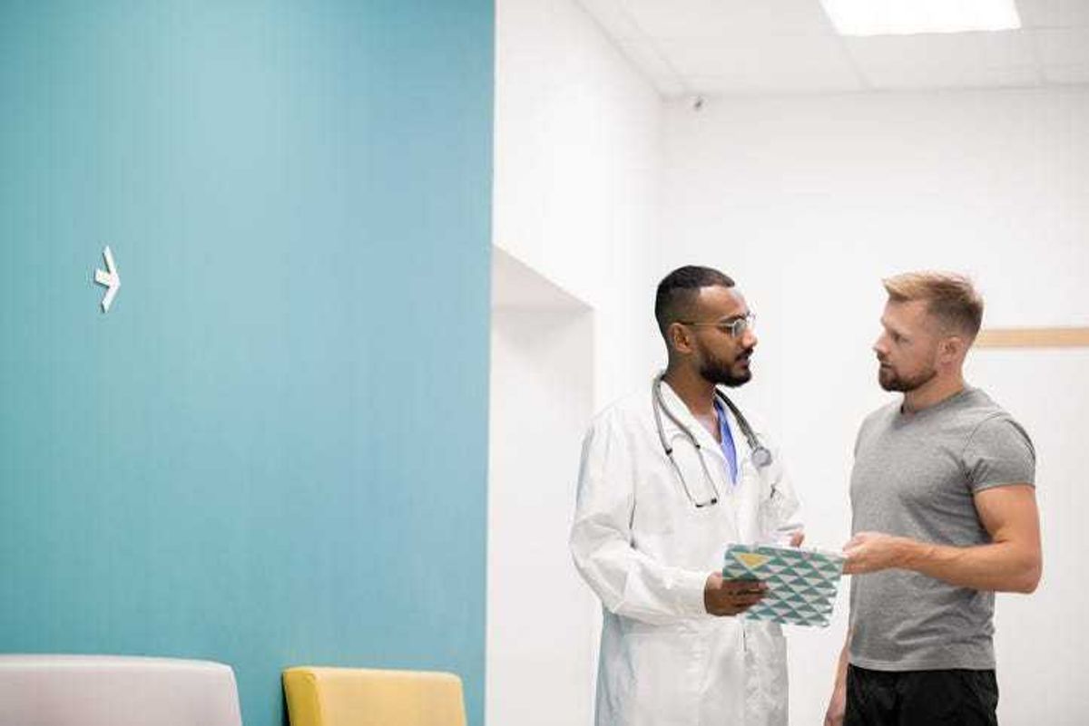 Young man at a doctors office.