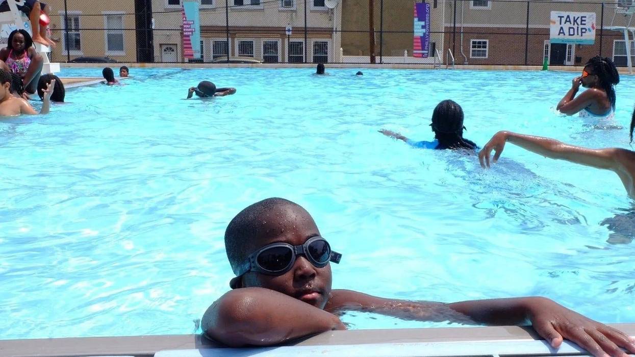 Young Philadelphians enjoying a pool in the summer.