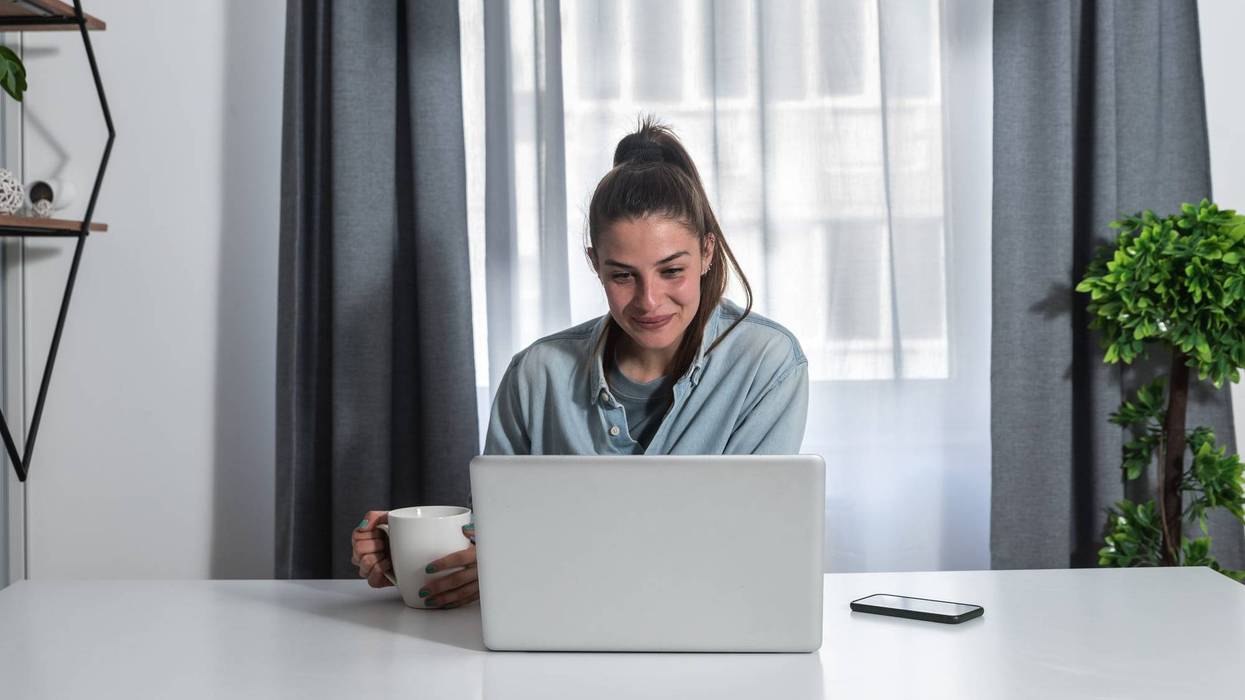 Young woman a psychotherapist doctor having online psychotherapy therapy with her patient and talk via video call on the laptop computer while she working at home in the home office