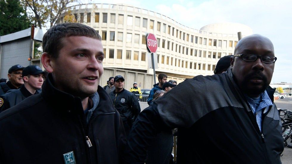 Zach Rehl and associate Tye Smith, after being escorted by police from a rally at Independence Mall to the Philadelphia Police Dept. headquarters on Nov. 17, 2018