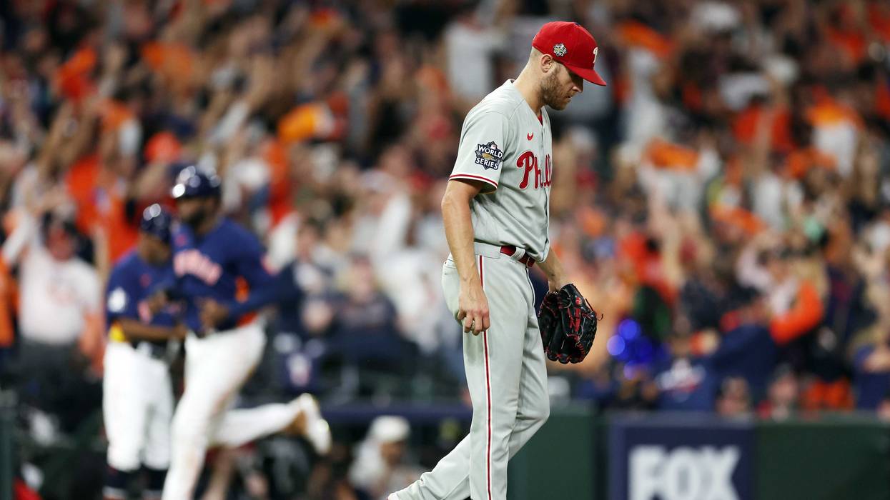 Zack Wheeler of the Philadelphia Phillies reacts after Alex Bregman of the Houston Astros hit a 3-run home run during the 5th inning of Game Two of the 2022 World Series at Minute Maid Park on October 29, 2022 in Houston, Texas.